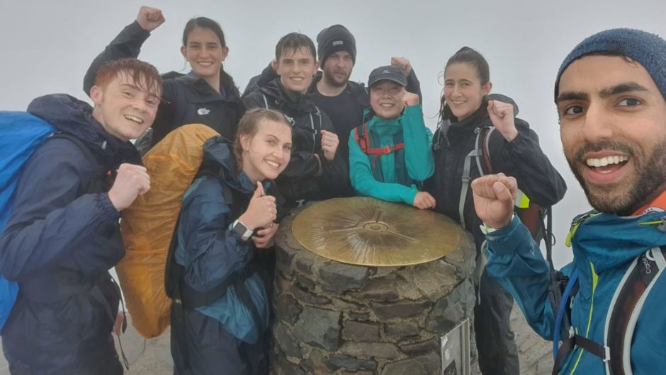 National three peaks challengers at summit in rain