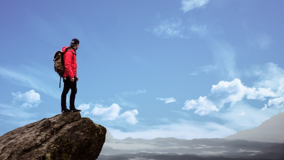 solo traveller looking out to scenery